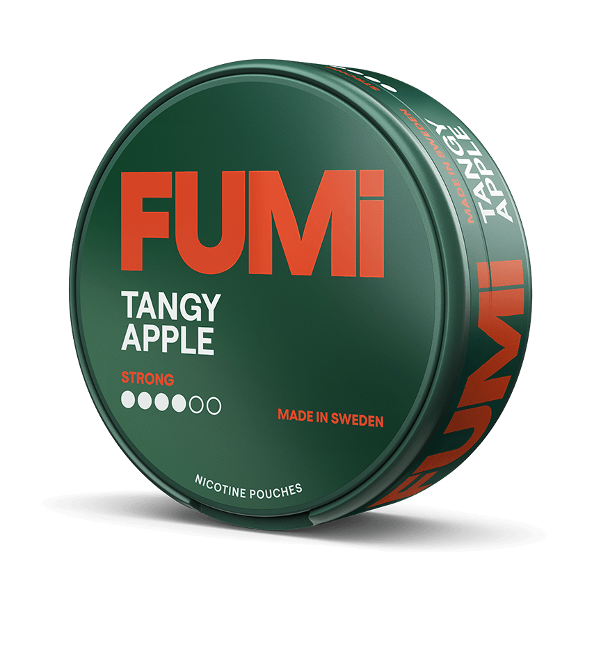 A round tin of Fumi Tangy Apple strong nicotine pouches, shown at a three-quarter angle on a solid black background. The packaging is dark green with bold orange and white lettering.