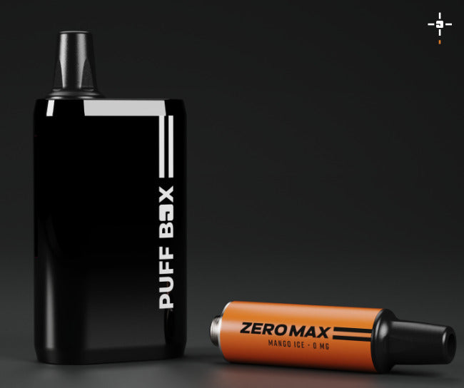Photo of a black Puff Box device standing upright with a Mango Ice 0mg pod to it's side