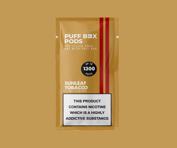 Puff Box Pods twin pack in Sunleaf Tobacco flavour on a light brown background