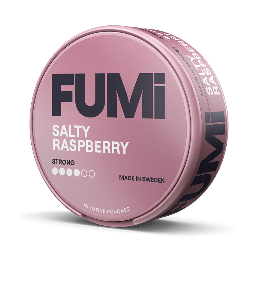 A round pink tin of FUMi Salty Raspberry nicotine pouches, shown at a three-quarter angle on a solid black background.