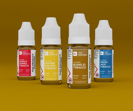 4 bottles of 10ml tobacco e-liquids on a brown background. Stars & Stripes Tobacco, Golden Rolling Tobacco, Blend 22 Tobacco and Union Jack Tobacco.