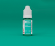 Bottle of Spearmint e-liquid on a green background