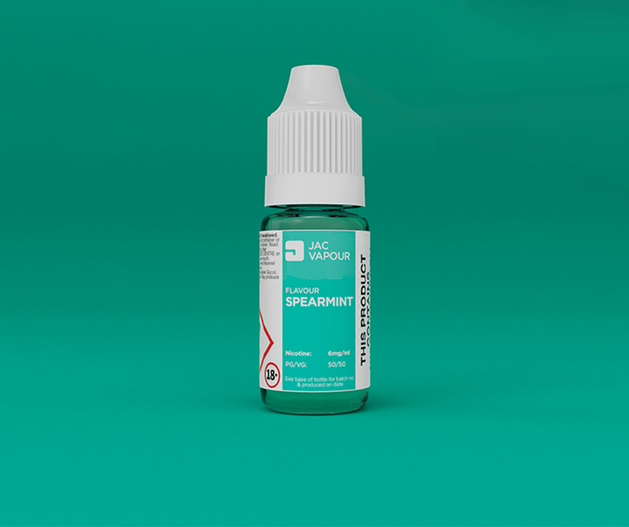 Bottle of Spearmint e-liquid on a green background